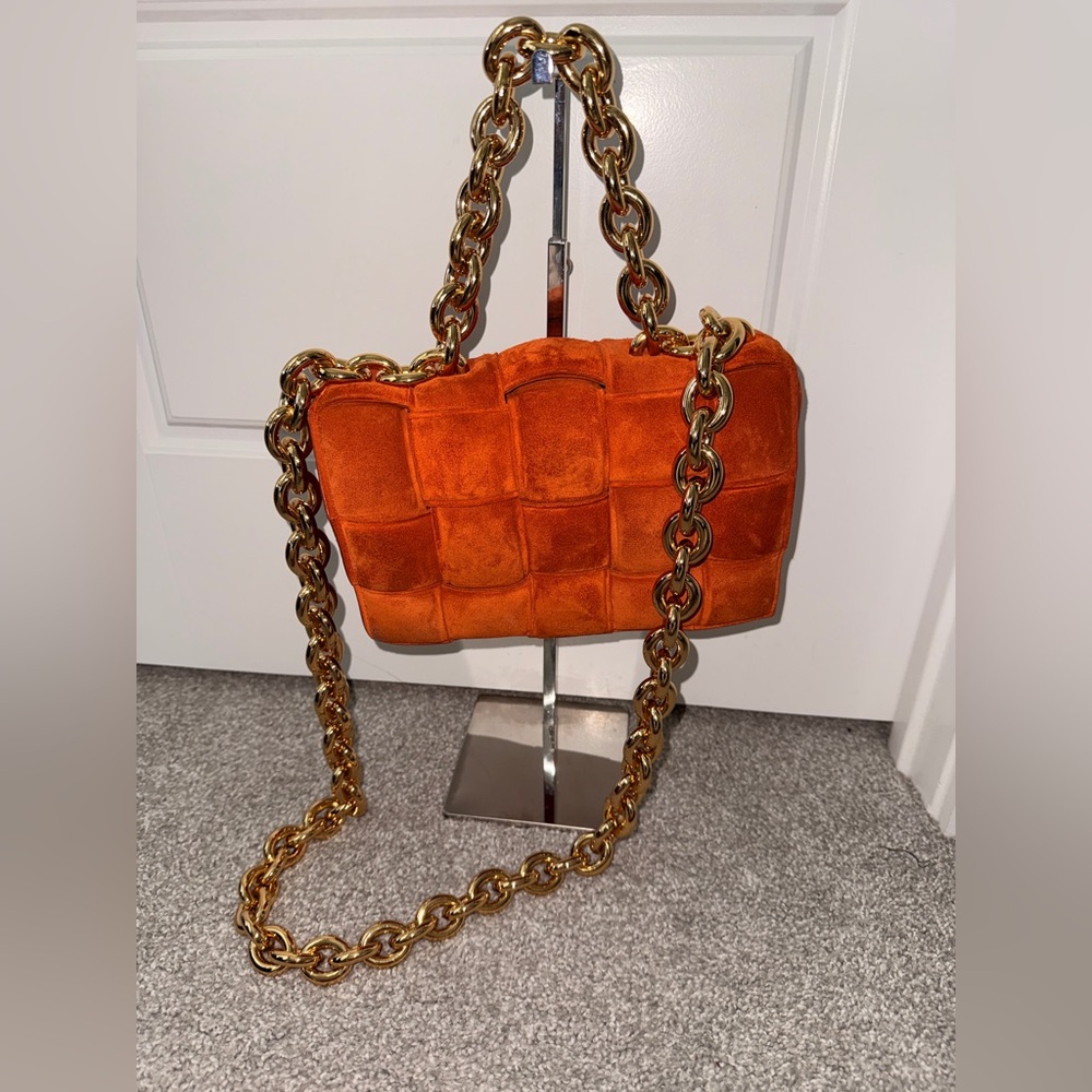 Bottega Veneta Chain Cassette bag in orange suede with a gold-tone chain strap